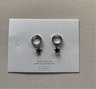 Pendientes de aro con estrella de plata de Creu