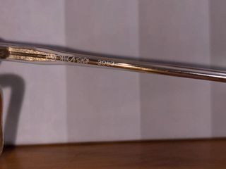 Gafas de sol mujer Luxottica doradas