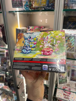 Case mini tin Pokemon Evoluzioni Prismatiche ITA
