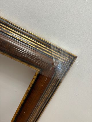 Marco de madera y dorado