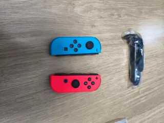 Joycons Nintendo Switch Azul y Rojo leer