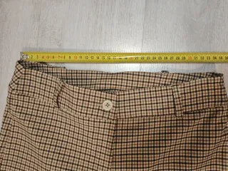 Pantaloni a quadri beige e marroni