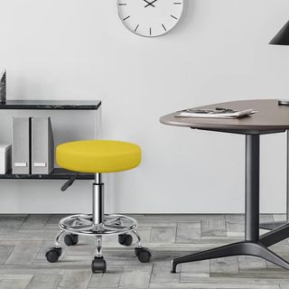 Taburete giratorio amarillo con ruedas