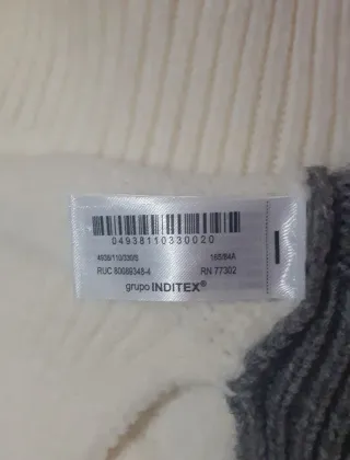 Chaleco de punto trenzado gris y blanco Zara