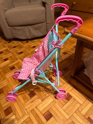 Carrito de muñecas rosa y azul