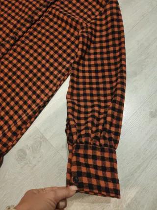 Camiciona a quadri arancione e nera