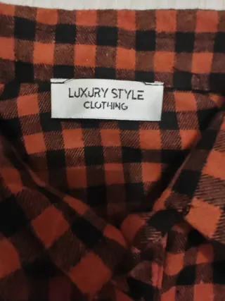 Camiciona a quadri arancione e nera