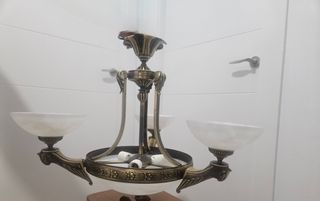 Lámpara colgante salón metal y cristal.