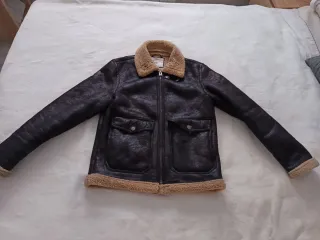 Chaqueta efecto piel forrada