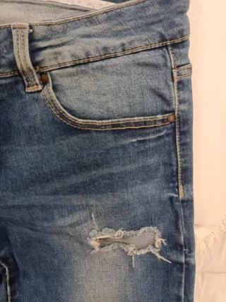 Pantalones vaqueros desgastados azules