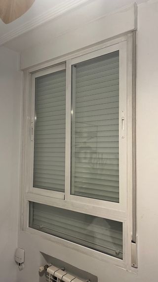 Ventana corredera con persiana