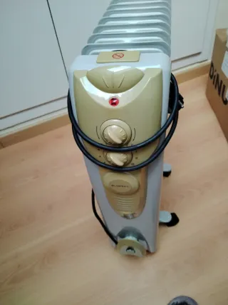 Radiador eléctrico beige y gris