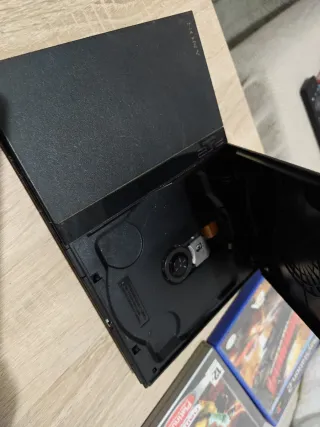 PlayStation 2 Slim + 3 Juegos + mando original.