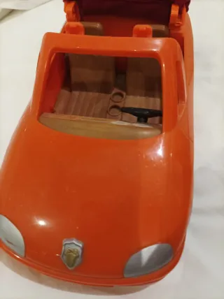 Familia Sylvanian con coche
