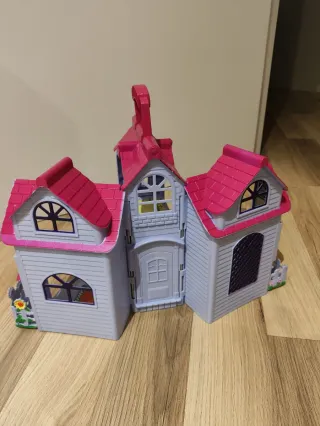 Casa de muñecas portátil con accesorios