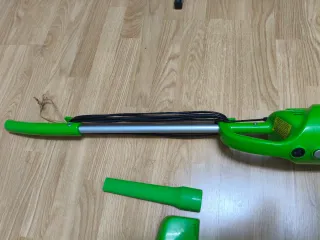 Aspirador de brazo verde