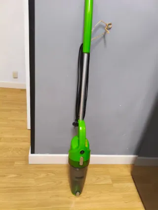 Aspirador de brazo verde