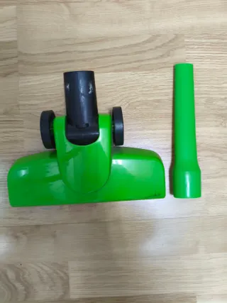 Aspirador de brazo verde