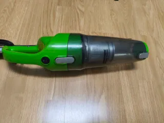 Aspirador de brazo verde