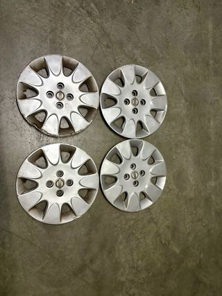 Tapacubos Nissan Micra K12 2007 15 pulgadas