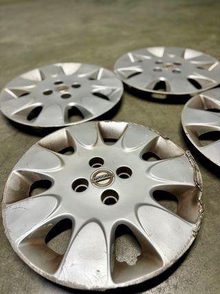 Tapacubos Nissan Micra K12 2007 15 pulgadas