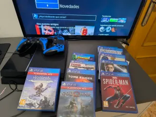 PS4 con 2 mandos y juegos