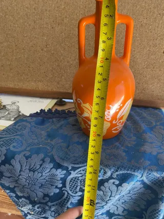 Bottiglia arancione decorata a mano