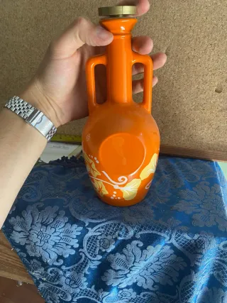 Bottiglia arancione decorata a mano