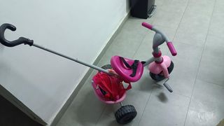 Triciclo para niña rosa con empujador