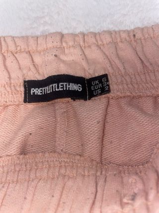 Pantalones de chándal beige/rosa