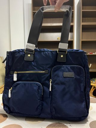 Bolso de trabajo y portátil azul