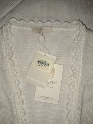 Chaqueta Bolero Niña Tizzas beige.