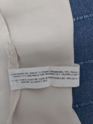 Camisa sin mangas beige con cremallera