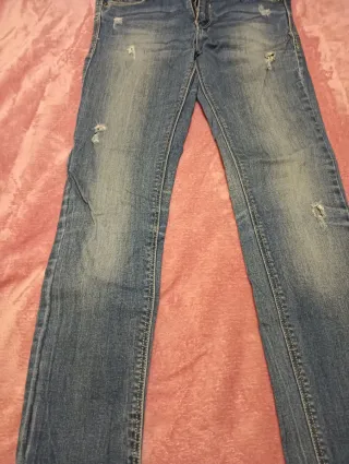 Pantalones vaqueros desgastados azules