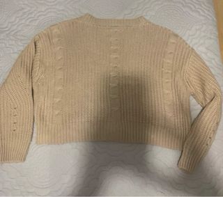 Chaqueta corta de punto beige