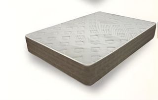 Colchón de tela gris y blanco