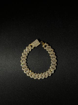 Bracciale a maglie dorato con strass