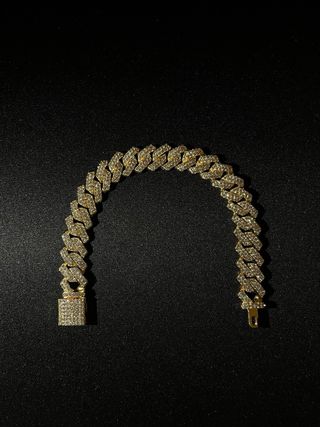 Bracciale a maglie dorato con strass