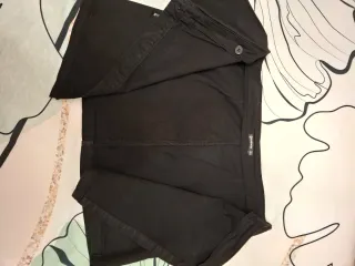 Falda mini Stradivarius negra estilo pareo