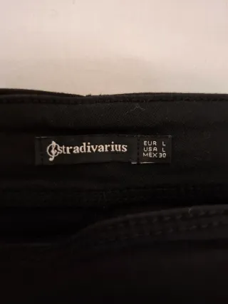 Falda mini Stradivarius negra estilo pareo