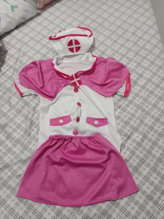 Disfraz infantil rosa y blanco