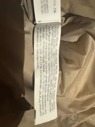 Abrigo plumífero Zara beige con capucha