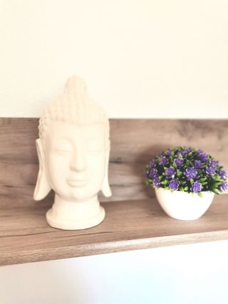 Buda blanco cerámica