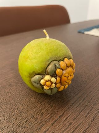 Candela Thun tonda decorata sole e fiori