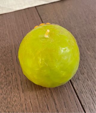 Candela Thun tonda decorata sole e fiori