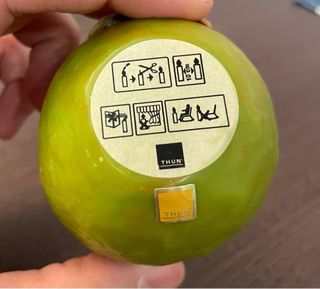 Candela Thun tonda decorata sole e fiori