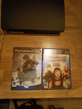 Console PS2 Nera + 5 Giochi