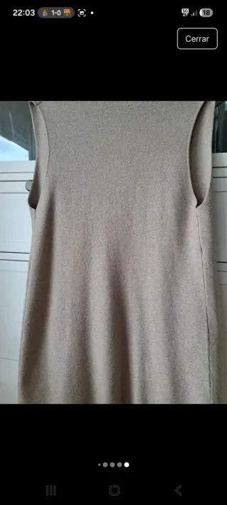 Chaleco largo beige con bolsillos