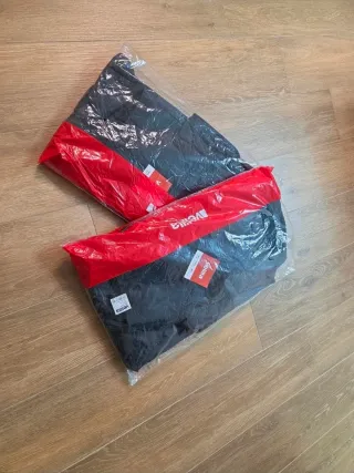 Chaleco Velilla bicolor negro y naranja