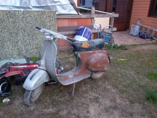 Vespa T3 con papeles